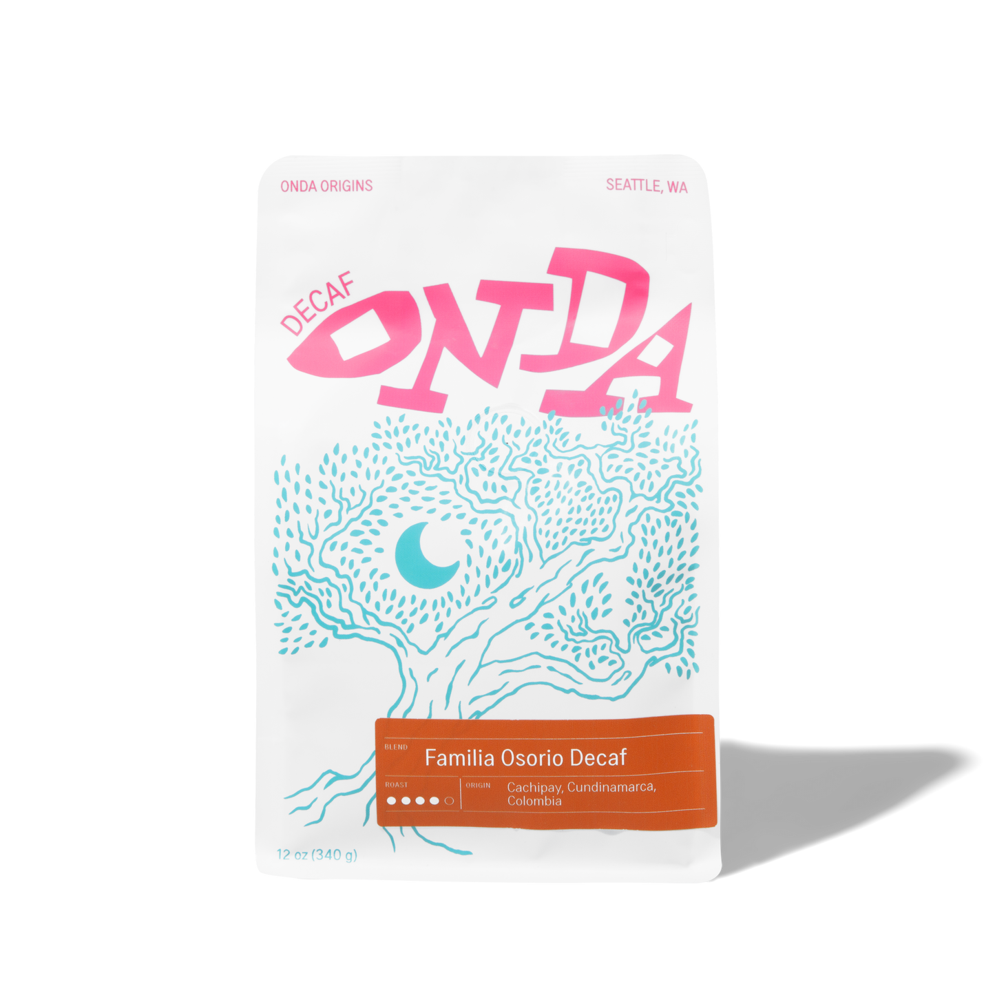 Onda coffee bag with pink and blue design on a white background decaf coffee from colombia whole bean coffee gifts
