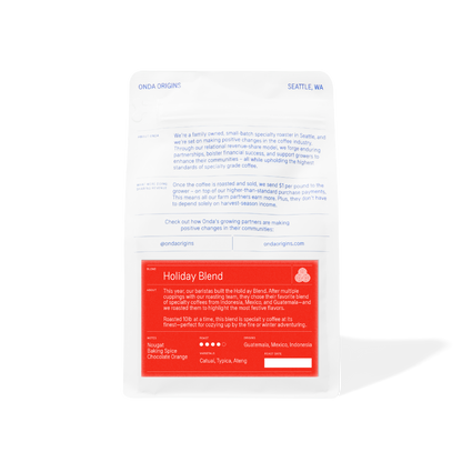 White bag with red sticker, coffee beans, holiday coffee gift, specialty holiday coffee blend