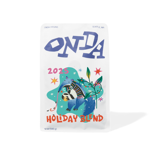 White bag of coffee with unique art, holiday blend, coffee gifts, festive coffee gift